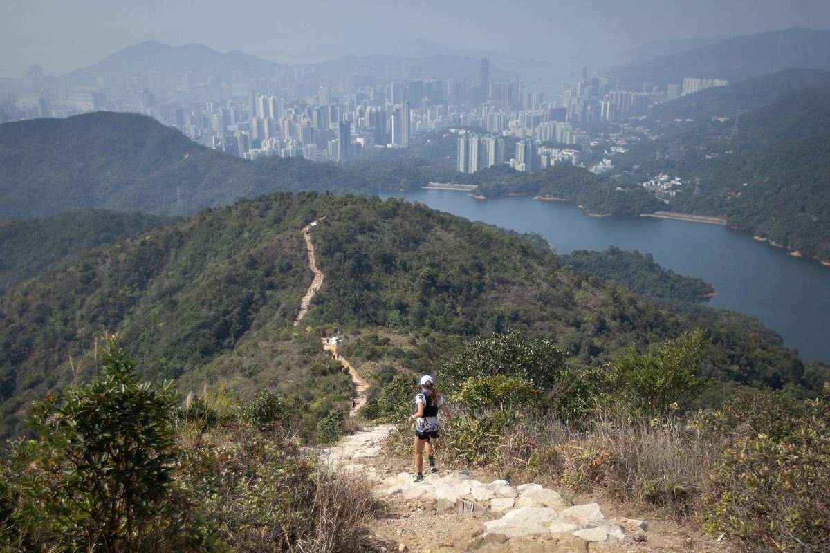 A runner on the Nine Dragons ridgeline above Hong Kong